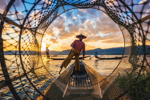 fisherman looking out on a net new perspective